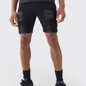 Skinny Stretch Distressed Denim Shorts In Black