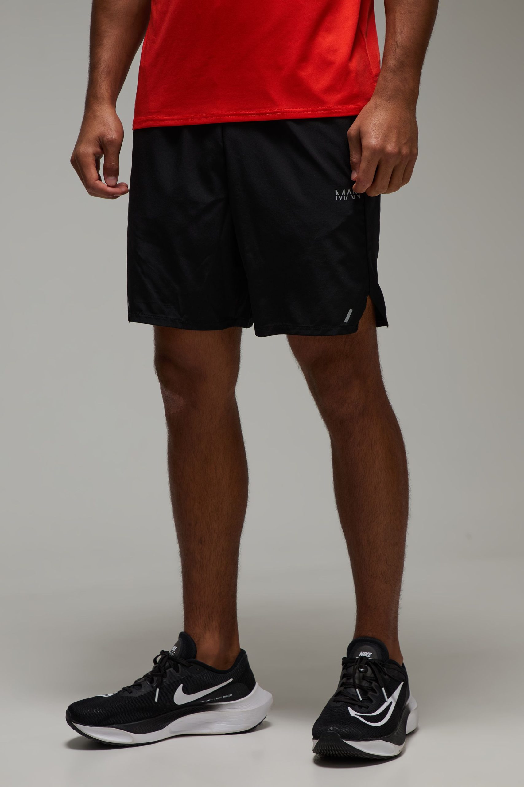 Man Active Perforated Stretch Woven 7inch Shorts