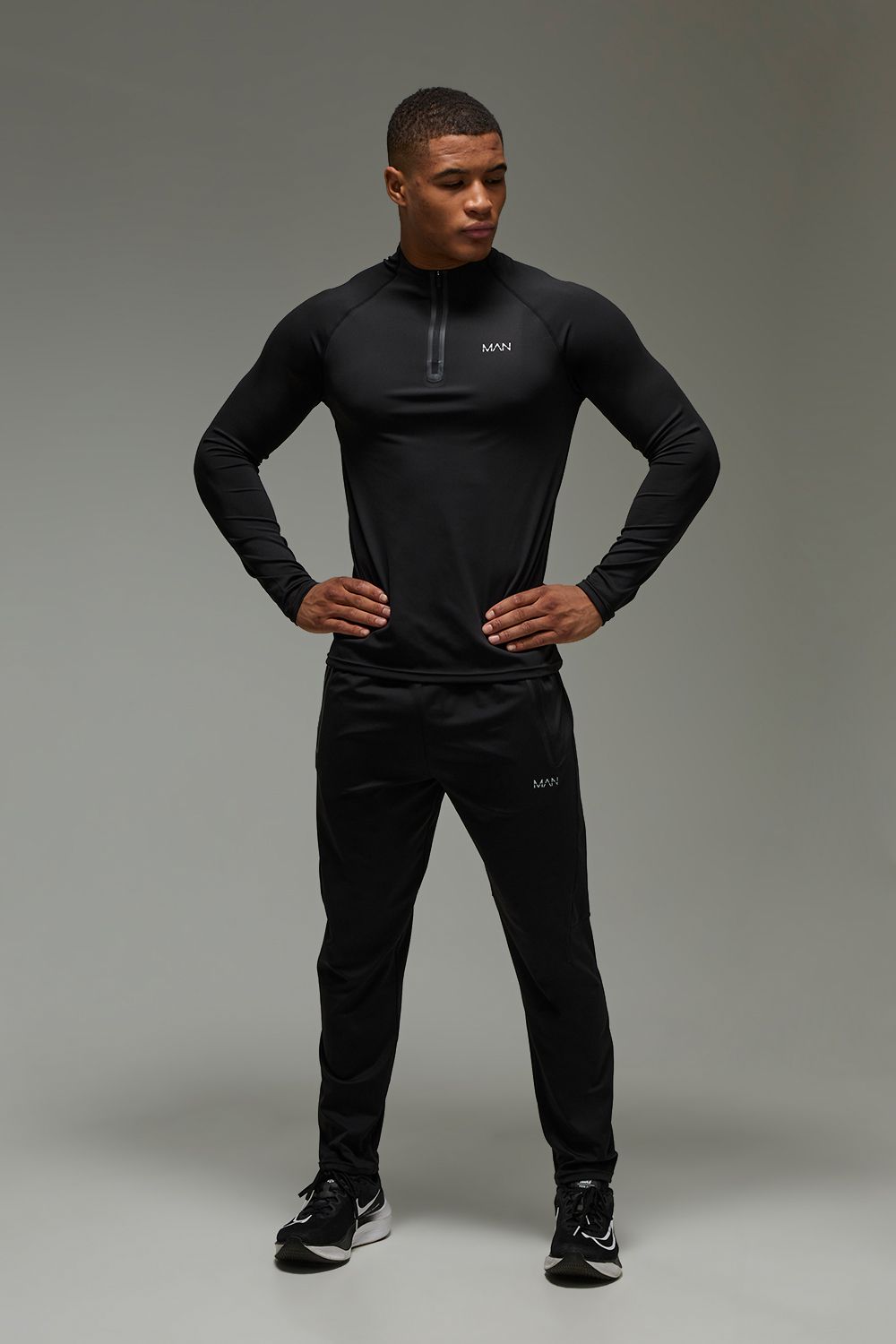 Man Active Slim Fit 1/4 Zip Tracksuit